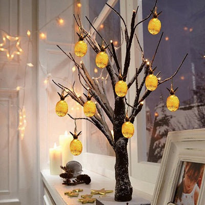 https://boutiquemonjardin.com/cdn/shop/files/guielande-lumiere-ananas-decoration-ambiance.jpg?v=1703361156